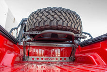 Load image into Gallery viewer, DV8 Offroad 2019+ Jeep Gladiator In-Bed Adjustable Tire Carrier - Additional View 5