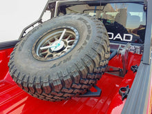 Load image into Gallery viewer, DV8 Offroad 2019+ Jeep Gladiator In-Bed Adjustable Tire Carrier - Additional View 7