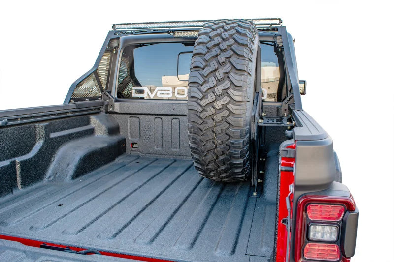 DV8 Offroad 2019+ Jeep Gladiator Universal Stand Up In-Bed Tire Carrier - Back View