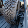 Load image into Gallery viewer, DV8 Offroad 2019+ Jeep Gladiator Universal Stand Up In-Bed Tire Carrier - Additional View 5