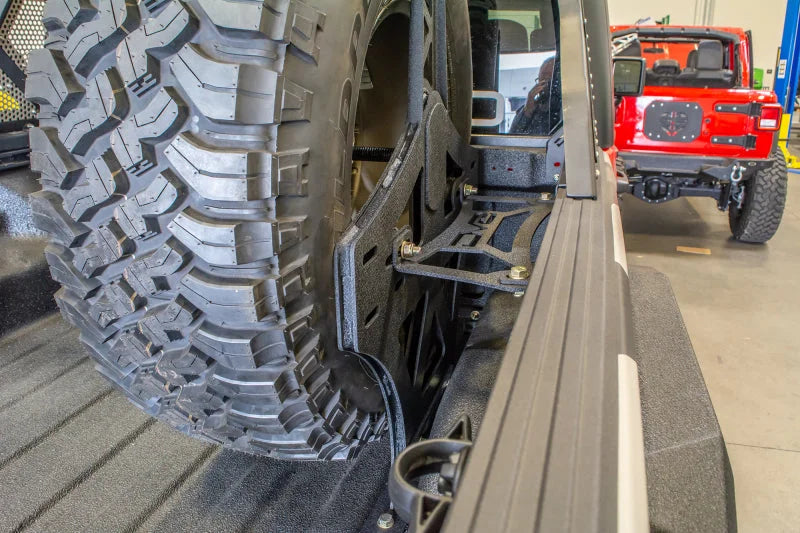 DV8 Offroad 2019+ Jeep Gladiator Universal Stand Up In-Bed Tire Carrier - Additional View 7