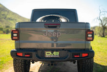 Load image into Gallery viewer, DV8 Offroad 2020+ Jeep Gladiator JT Adjustable In-Bed Tire Carrier - Side View