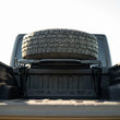 Load image into Gallery viewer, DV8 Offroad 2020+ Jeep Gladiator JT Adjustable In-Bed Tire Carrier - Back View
