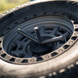 Load image into Gallery viewer, DV8 Offroad 2020+ Jeep Gladiator JT Adjustable In-Bed Tire Carrier - Installation View
