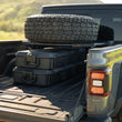 Load image into Gallery viewer, DV8 Offroad 2020+ Jeep Gladiator JT Adjustable In-Bed Tire Carrier - Additional View 6