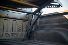 Load image into Gallery viewer, DV8 Offroad 2020+ Jeep Gladiator JT Adjustable In-Bed Tire Carrier - Additional View 7