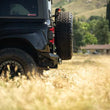 Load image into Gallery viewer, DV8 Offroad 2021+ Ford Bronco Competition Series Rear Bumper - Side View