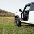 Load image into Gallery viewer, DV8 Offroad 2021+ Ford Bronco Foot Peg Pair - Black - Additional View 7