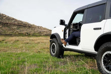 Load image into Gallery viewer, DV8 Offroad 2021+ Ford Bronco Foot Peg Pair - Black - Additional View 7