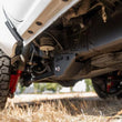 Load image into Gallery viewer, DV8 Offroad 2024+ Toyota Tacoma Trailing Arm Skid Plates - Installation View