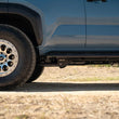 Load image into Gallery viewer, DV8 Offroad 2025-2026 Toyota 4Runner Trailing Arm Skid Plates - Installation View