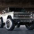 Load image into Gallery viewer, DV8 Offroad 21-22 Ford Bronco Competition Series Front Bumper - Side View