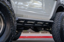 Load image into Gallery viewer, DV8 Offroad 21-22 Ford Bronco FS-15 Series Rock Sliders - Installation View