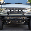 Load image into Gallery viewer, DV8 Offroad 21-22 Ford Bronco Factory Front Bumper Licence Relocation Bracket - Front - Additional View 15