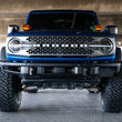 Load image into Gallery viewer, DV8 Offroad 21-22 Ford Bronco Factory Front Bumper License Relocation Bracket - Side - Back View