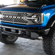 Load image into Gallery viewer, DV8 Offroad 21-22 Ford Bronco Factory Front Bumper License Relocation Bracket - Side - Additional View 13