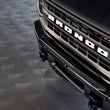 Load image into Gallery viewer, DV8 Offroad 21-22 Ford Bronco Factory Modular Front Bumper Bull Bar - Side View