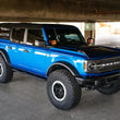 Load image into Gallery viewer, DV8 Offroad 21-22 Ford Bronco OE Plus Series Side Steps - Installation View