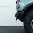 Load image into Gallery viewer, DV8 Offroad 21-23 Ford Bronco Capable Bumper Front License Plate Mount - Additional View 8