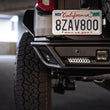Load image into Gallery viewer, DV8 Offroad 21-23 Ford Bronco Rear License Plate Relocation Bracket - Back View