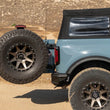 Load image into Gallery viewer, DV8 Offroad 21-24 Ford Bronco Tire Carrier - Side View