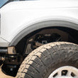 Load image into Gallery viewer, DV8 Offroad 21-25 Ford Bronco Addictive Desert Designs Front Inner Fender Liners - Additional View 9