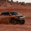 Load image into Gallery viewer, DV8 Offroad 21-25 Ford Bronco Tube Serries Front Bumper - Black Powdercoat - Additional View 7