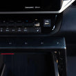 Load image into Gallery viewer, DV8 Offroad 22-23 Toyota Tundra Center Console Molle Panels/Device Mount - Installation View