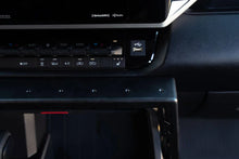 Load image into Gallery viewer, DV8 Offroad 22-23 Toyota Tundra Center Console Molle Panels/Device Mount - Installation View