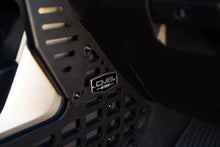 Load image into Gallery viewer, DV8 Offroad 22-23 Toyota Tundra Center Console Molle Panels/Device Mount - Additional View 9