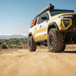 Load image into Gallery viewer, DV8 Offroad 23-24 Chevy Colorado OE Plus Side Steps - Black Steel - Side View