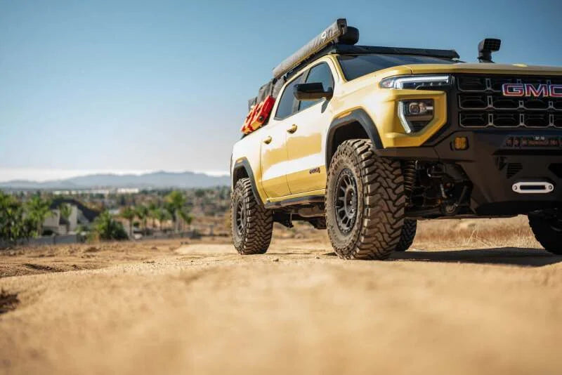 DV8 Offroad 23-24 Chevy Colorado OE Plus Side Steps - Black Steel - Side View