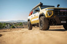 Load image into Gallery viewer, DV8 Offroad 23-24 Chevy Colorado OE Plus Side Steps - Black Steel - Side View