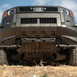 Load image into Gallery viewer, DV8 Offroad 24-25 Toyota Land Cruiser A-Arm Skid Plate - Side View