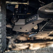 Load image into Gallery viewer, DV8 Offroad 24-25 Toyota Land Cruiser A-Arm Skid Plate - Back View