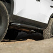 Load image into Gallery viewer, DV8 Offroad 24-25 Toyota Land Cruiser OE Plus Side Steps - Black Steel - Back View