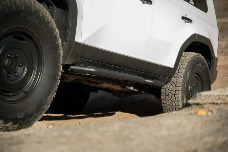 DV8 Offroad 24-25 Toyota Land Cruiser OE Plus Side Steps - Black Steel - Back View