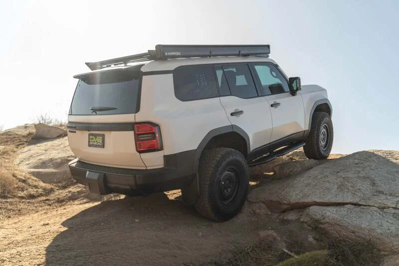 DV8 Offroad 24-25 Toyota Land Cruiser OE Plus Side Steps - Black Steel - Installation View