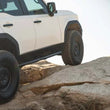 Load image into Gallery viewer, DV8 Offroad 24-25 Toyota Land Cruiser OE Plus Side Steps - Black Steel - Additional View 5