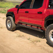 Load image into Gallery viewer, DV8 Offroad 24-25 Toyota Tacoma Double Cab Rock Sliders - Additional View 8