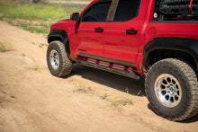 Load image into Gallery viewer, DV8 Offroad 24-25 Toyota Tacoma Double Cab Rock Sliders - Additional View 8