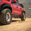 Load image into Gallery viewer, DV8 Offroad 24-25 Toyota Tacoma Double Cab Rock Sliders - Additional View 10