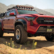 Load image into Gallery viewer, DV8 Offroad 24-25 Toyota Tacoma Double Cab Rock Sliders - Additional View 13