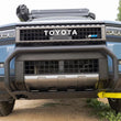 Load image into Gallery viewer, DV8 Offroad 24-26 Toyota Land Cruiser Brush Guard - Front - Installation View