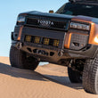 Load image into Gallery viewer, DV8 Offroad 24-26 Toyota Land Cruiser Spec Series Front Bumper - Installation View