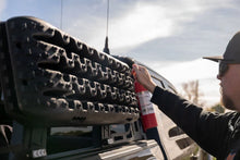 Load image into Gallery viewer, DV8 Offroad DV8 Xtract Traction Boards | Pair | Black - Installation View