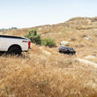 Load image into Gallery viewer, DV8 Offroad Elite Series D-Ring Shackles - Pair (Black) - Side View