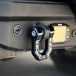 Load image into Gallery viewer, DV8 Offroad Elite Series D-Ring Shackles - Pair (Black) - Installation View