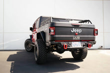 Load image into Gallery viewer, DV8 Offroad Elite Series D-Ring Shackles - Pair (Red) - Main Product View