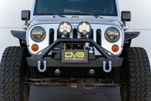Load image into Gallery viewer, DV8 Offroad Fairlead Mounted Flip-Up License Plate Bracket - Side View